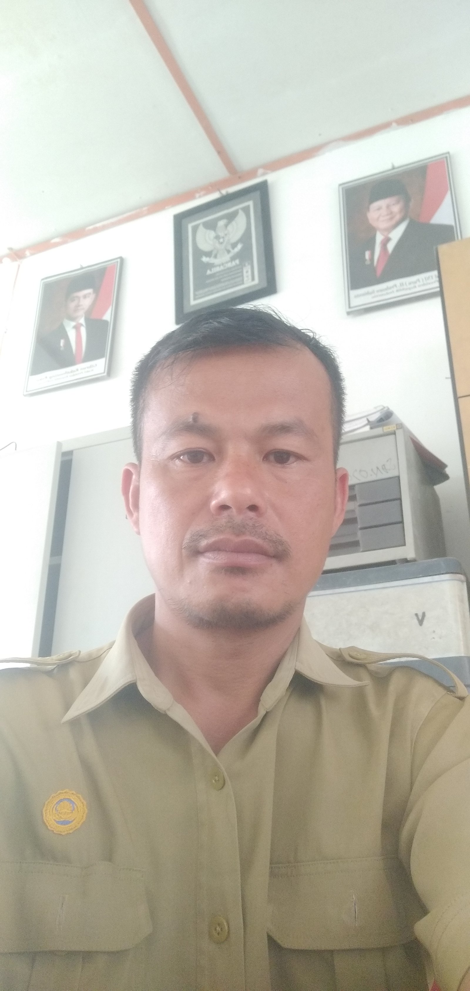Yasnudi Waruwu, S.Pd